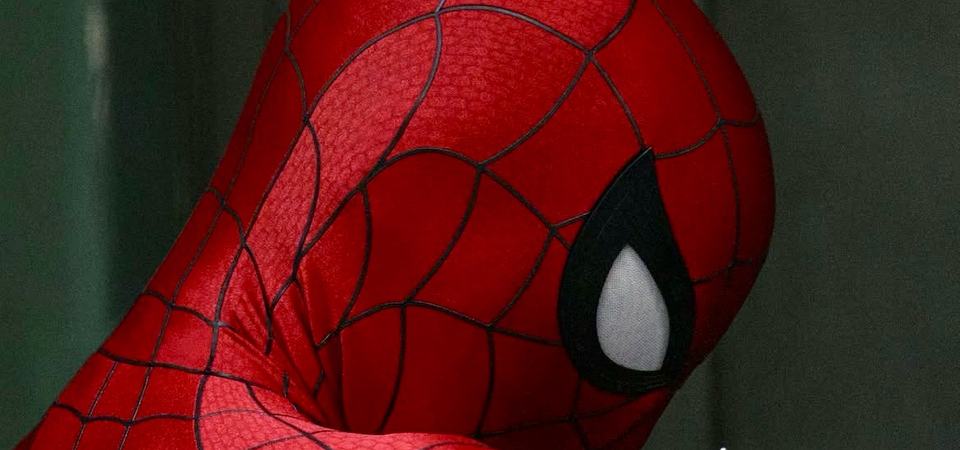 A Damage Control operative's reflective tactical visor and helmet in a still from Spider-Man: Brand New Day