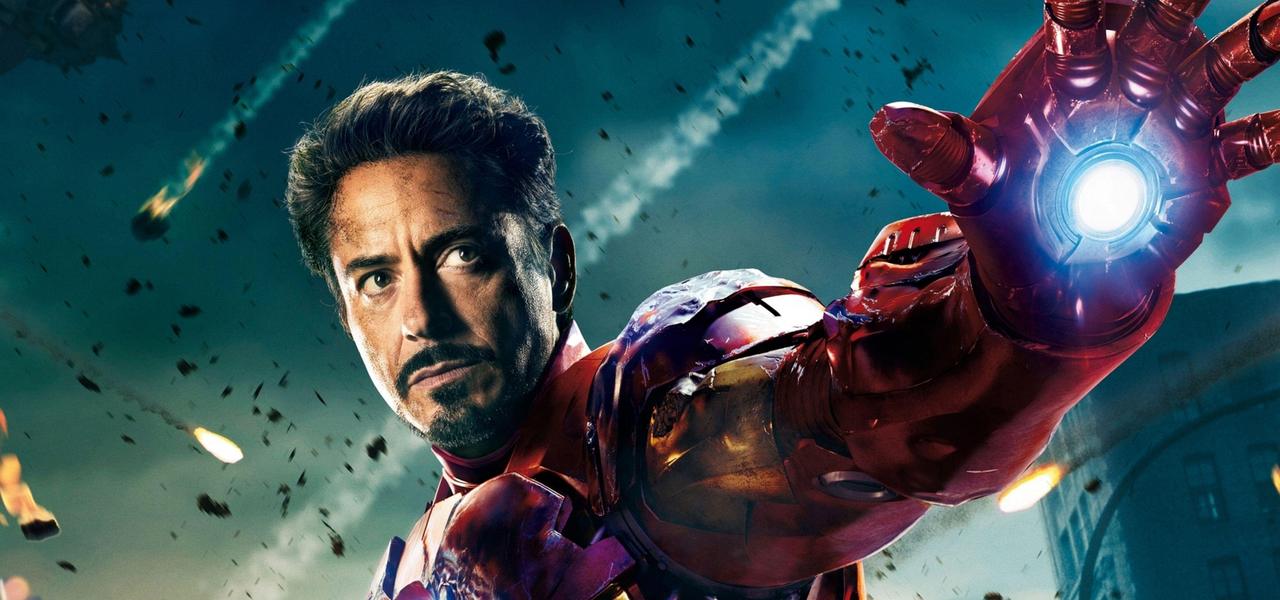 Iron Man's Mark VII armour standing amid rubble and Chitauri wreckage in Manhattan