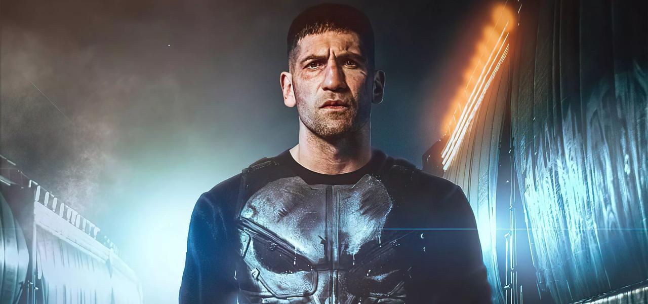 Frank Castle standing alone in the fog on a dark New York City street